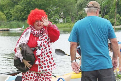 Rosie the Clown from the Cataraqui Canoe Club welcomed the paddlers.